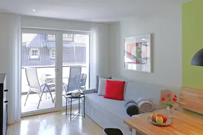a living room with a couch and a table at Apartment Luis 1 - Alpstay in Naturno