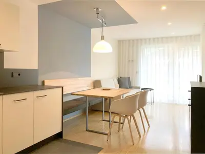 a kitchen and dining room with a table and chairs at Apartment Luis 2 - Alpstay in Naturno