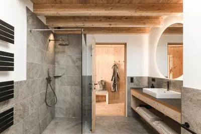 a bathroom with a shower and a sink at Wieserhof Family Farm in Maranza