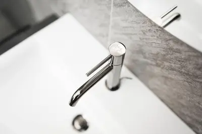 a bathroom sink with a faucet on a counter at Wieserhof Family Farm in Maranza