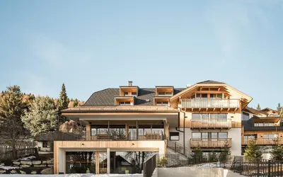 a large house with a lot of windows at Wieserhof Family Farm in Maranza