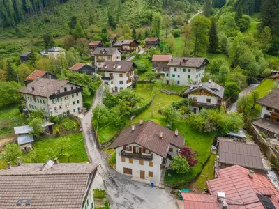 an aerial view of a village with houses at La Casa di Elvira-Mansarda in Alleghe