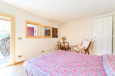 a bedroom with a bed and a window at Chalet Monciòn in Rualp