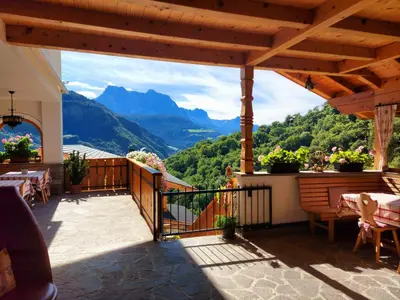 a balcony with a view of the mountains at Marxhof in Barbiano
