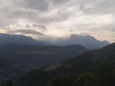 a view of a valley with mountains in the distance at Mitterhofer Appartements in Villandro