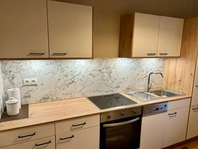 a kitchen with a sink and a counter top at Apartment Martha in Sankt Leonhard in San Leonardo in Passiria
