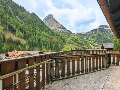 a balcony with a view of the mountains at Apartment Albert by Interhome in Penia
