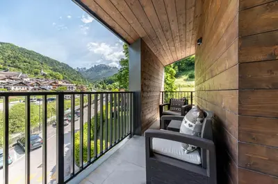 a balcony with a view of the mountains at Sass Maor - Caminetto in Transacqua
