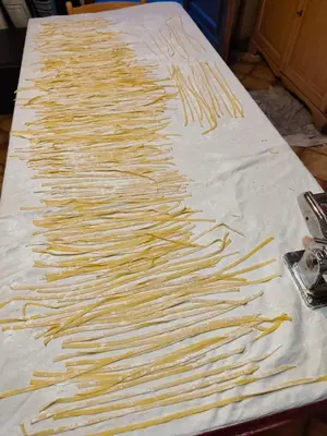 a bunch of spaghetti sitting on top of a table at Il Giardino dell'Eden in Caprile