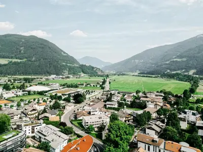 an aerial view of a town in the mountains at Suite by Silvy in Vipiteno