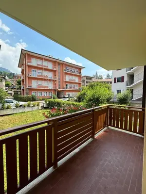 a balcony with a view of a building at Appartamenti Donatella in Cavalese