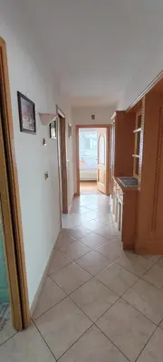 a hallway of a home with a tile floor at Appartamenti Donatella in Cavalese