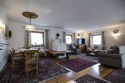 a living room with a table and a couch at Villetta Chiave in Chiave