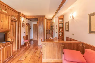 a home office with a bar in a room at Casa Crignes, residenziale a due passi dal centro in Cortina dʼAmpezzo