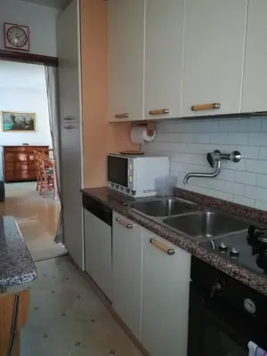a kitchen with a sink and a microwave at Casa Alice in Mezzano