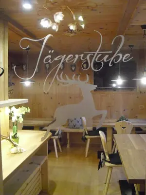 a restaurant with a sign that reads zetter cafe at Garni Tramans in Selva di Val Gardena