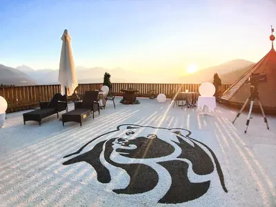 a rug with a picture of a bear on it at Bärenhotel in Valdaora