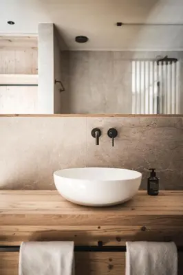 a white sink on a wooden counter in a bathroom at Florisa Mountain Chalet in Tires