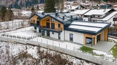 an aerial view of a house in the snow at Fiemme in Vista in Ziano di Fiemme