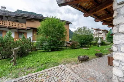 a view of a yard with a house at Cesa de Sass in Mazzin