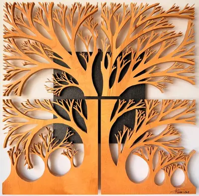 a gate with a tree design on a wall at Alberi di Fiemme in Castello di Fiemme