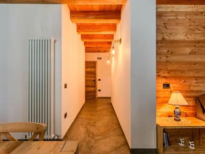 a bathroom with a toilet and a sink at Apartment Larice Bilocale by Interhome in Livo