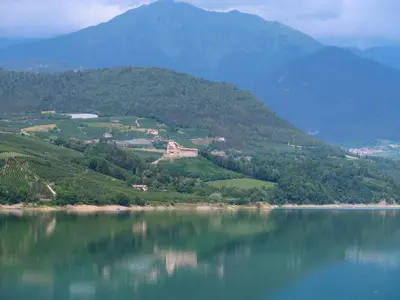 a view of a large body of water with mountains at Apartment Larice Bilocale by Interhome in Livo