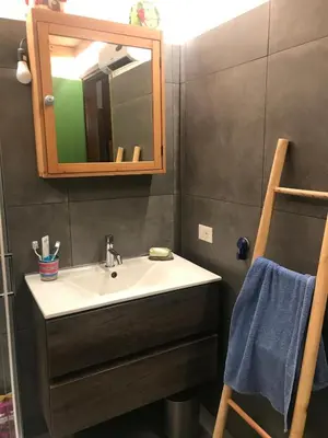 a bathroom with a sink and a mirror at La Tana della Volpe, Falcade - BL in Falcade