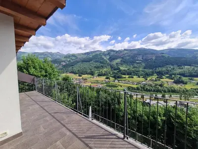 a balcony with a view of the mountains at Finestra sulle Vette in Tesero