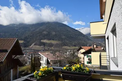 a view of a mountain from a city at Casa di Maria Grazia in Bressanone