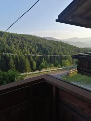 a view from the balcony of a house with a mountain at Pension Ferienwohnungen Marchnerhof in Terento