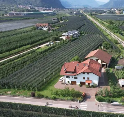 an aerial view of a house in a vineyard at Schabelhof in Laives