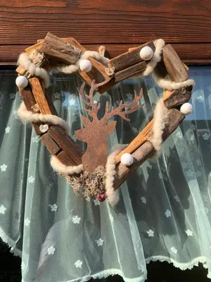 a christmas star decoration with a reindeer on it at Chalet le Dolomiti in Borca di Cadore