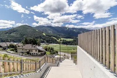 a view from the balcony of a house with mountains at Proventus Apartments in Perca