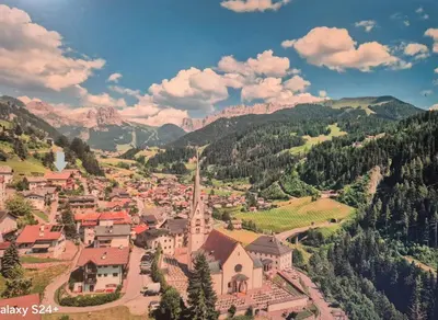 an aerial view of a small town in the mountains at Gianni's Home2 Santa Cristina VG in Santa Cristina in Val Gardena