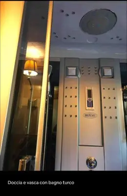 a elevator in a building with a light on the ceiling at Cottage Cortina d Ampezzo in Cortina dʼAmpezzo