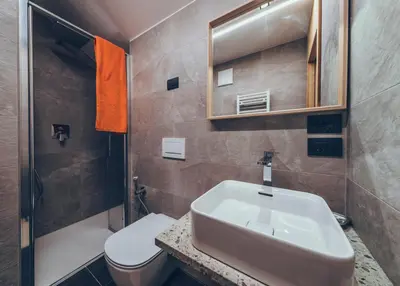 a bathroom with a sink and a toilet at Sella Ronda dalla Val di Fassa - CiasaNu 1° Piano in Pozza di Fassa