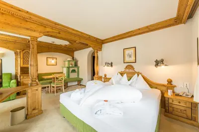 a room with a wall with a climbing wall at Mirabell Dolomites Hotel in Valdaora