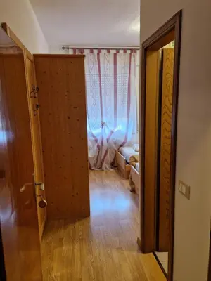 an open door to a room with a bed at Albergo Passione Ristorante Pizzeria Romallo in Romallo
