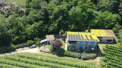 an aerial view of a house with a yellow roof at Kreuzsteinhof in San Paolo