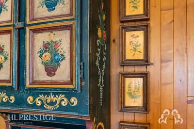 a hallway of a house with a wooden door at Chalet Boite - Cortina in Cortina dʼAmpezzo