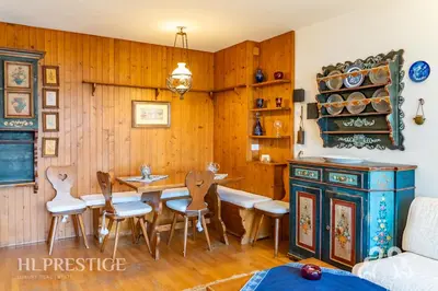 a door with paintings of flowers on it at Chalet Boite - Cortina in Cortina dʼAmpezzo