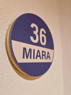 a sign on a wall that says maria at Apartments Angela in San Vigilio Di Marebbe