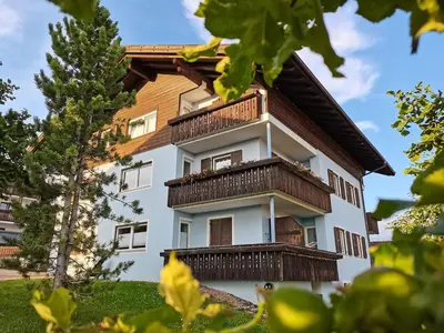 a building with balconies on the side of it at Nock Apartment Dolomites in South Tyrol - Italy in Nova Ponente