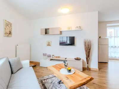 a hallway with a wooden door in a room at Apartment Relax tra i Monti by Interhome in Livo