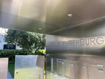a building with a sign that reads vla erinrupal at Villa Ehrenburg - Private Apartments in Merano
