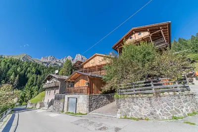 a house on the side of a mountain at Chalet Dolomites Heart in Feder