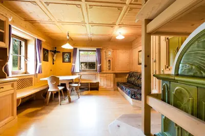a living room with a table and a couch at Ferienhaus Daniel in Racines