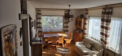 a living room with a couch and a table at Casa Scacciapensieri in Pera