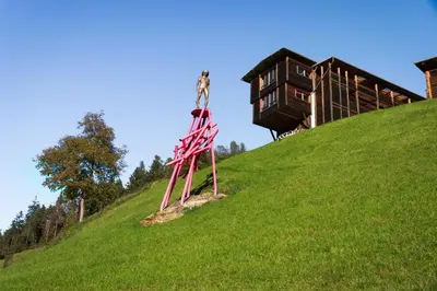 a group of people standing on top of a hill at LA FUNDNEYT art & guesthouse in Laion